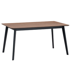 Rebi with its harmonious blend of walnut and black finishes, brings a contemporary touch to any dining space. The walnut table top offers a warm, inviting feel, while the black legs provide a modern contrast. Perfect for family dinners or entertaining gue