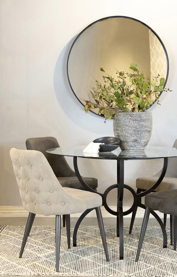  this dining side chair is a stylish and versatile addition to any dining space. The gently curved backrest features elegant button tufting on the exterior and a smooth