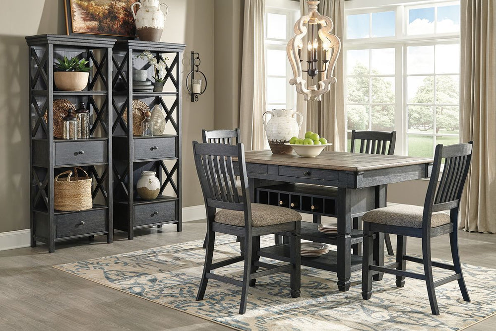 Unique two-tone finish with a combination of Oak and Acacia substrates combining a trendy textured antique black color with table and server tops finished in a textural weathered oak finish. Rectangular dining table features six convenient drawers for sto
