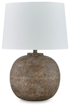 Combining premium quality materials with unique high-style design, this table lamp brings a touch of easy artisan texture to a room. Color variations throughout add an almost antique feel and make each piece unique.<br><br><b>Additional Dimensions</b><br>