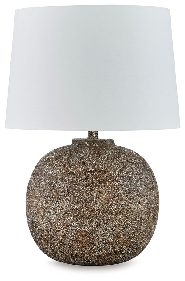 Combining premium quality materials with unique high-style design, this table lamp brings a touch of easy artisan texture to a room. Color variations throughout add an almost antique feel and make each piece unique.<br><br><b>Additional Dimensions</b><br>