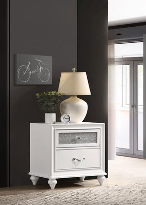  white nightstand is embellished with touches of sparkle to add a pop of pizzazz to any bedroom. The faceted crystal hardware glistens and gleams. The glittery acrylic panels sparkle an