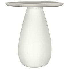 Introduce a touch of modern artistry to your living space with this unique side table, thoughtfully crafted from engineered wood. Its sculptural form and softly contoured edges create a striking silhouette thatâ€™s both playful and refined. Viewed from ab