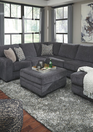  contemporary style and long on comfort. Plushly upholstered in a slate gray fabric