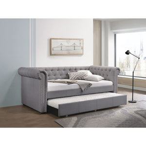 The Justice upholstered daybed is a traditional vintage luxe stunner. It boasts glam rolled arms with nailhead trim and button tuft detailing. An under-bed trundle included for over an extra overnight guest. Enjoy this beautiful and functional daybed in y