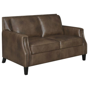 Friends and family will remember your exceptional taste in style when they see this brown sugar loveseat. Upholstered in soft leather grain fabric, this piece is an immediate enhancement to your living area. Back cushions with welted trim make this lovese