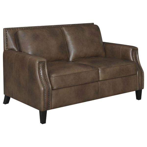 Friends and family will remember your exceptional taste in style when they see this brown sugar loveseat. Upholstered in soft leather grain fabric, this piece is an immediate enhancement to your living area. Back cushions with welted trim make this lovese