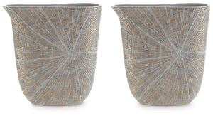 A unique mix of primitive and modern, this vase has an exquisite artisanal appeal. Its wide mouth holds your most bountiful bouquets. The vaseâ€™s intriguing silhouette and starburst pattern capture the eye, complementing a room that craves sophistication