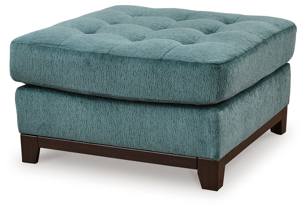 Express your uniquely chic style with this oversized ottoman. Its fresh approach to color creates a vibrant yet refined vibe in your living room that friends and family will love to lounge in. And you can count on classic comfortâ€”the plush upholstery ke
