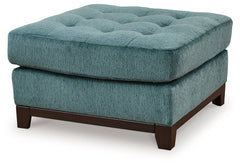 Express your uniquely chic style with this oversized ottoman. Its fresh approach to color creates a vibrant yet refined vibe in your living room that friends and family will love to lounge in. And you can count on classic comfortâ€”the plush upholstery ke