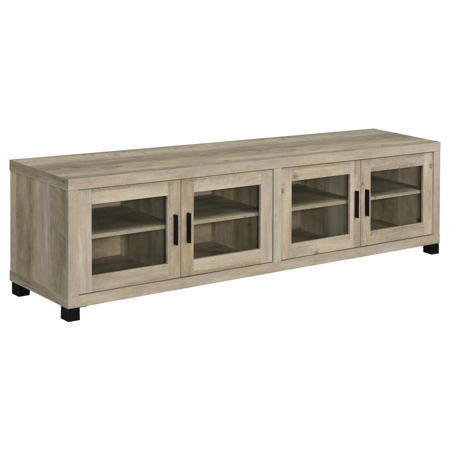 Upgrade your entertainment space with this 79-inch TV stand, featuring a contemporary boxy silhouette and smooth surfaces. The distressed pine finish enhances its rustic appeal, while the glass-paneled cabinet doors add a refined touch. Adjustable shelves