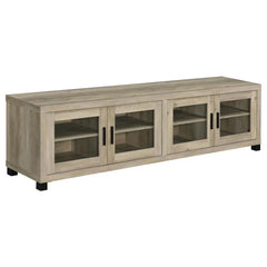 Upgrade your entertainment space with this 79-inch TV stand, featuring a contemporary boxy silhouette and smooth surfaces. The distressed pine finish enhances its rustic appeal, while the glass-paneled cabinet doors add a refined touch. Adjustable shelves