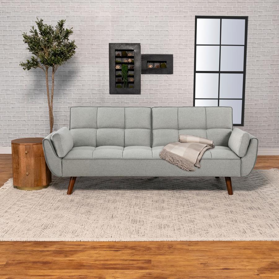 Elevate your space with our mid-century modern sofa beds. Upholstered in soft fabric, they offer plush cushioning with biscuit-tufted back and seat. The attached arm cushions enhance comfort. Easily converts from a sofa to a bed with a folding back. Durab