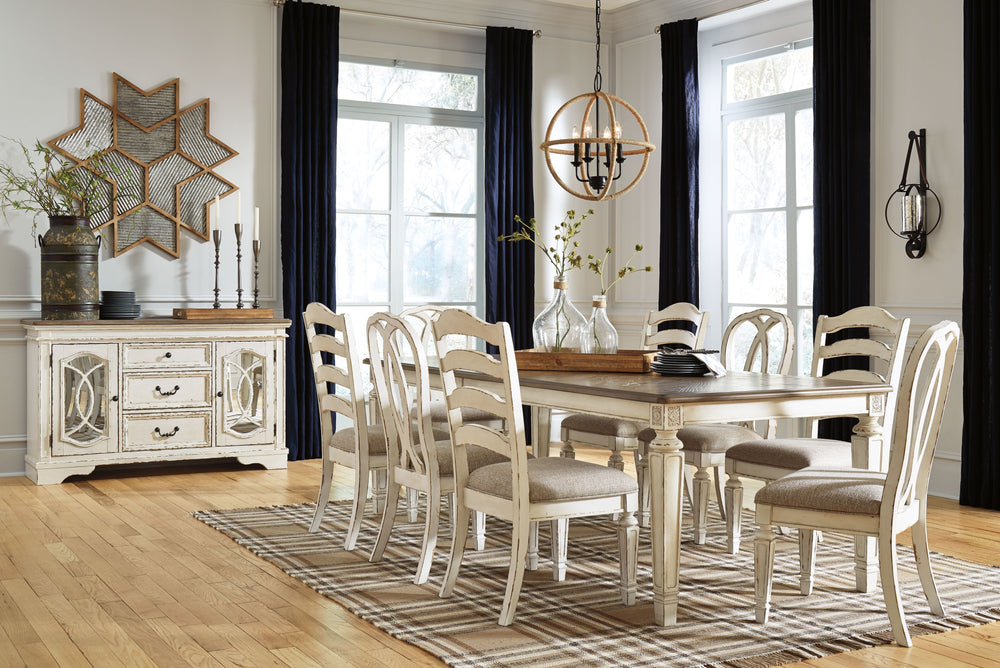 Traditional cottage design. Antiqued two-tone finish featuring chipped white with distressed wood finished tops. Tops feature Oak veneers, while the cases are made with birch veneers and hardwood solids. Framed drawer fronts and decorative fret laid over 