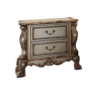 The Dresden nightstand is a new rendition to a classic style, finished in gold patina with a hint of gold. The antiqued look is further highlighted with hand applied burnish. This nightstand features two Felt-Lined drawers with detailed French front and b