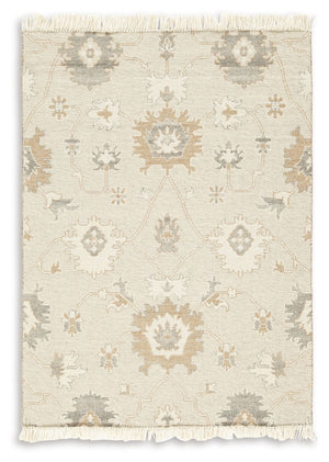 Bring modern life into balance with the rhythms and beauty of nature. This area rug has the vintage look of an heirloom. Blooming with graceful florals in neutral tones and surrounded by fringe edging, it adds style to any lounge space.<br/><br/><b>Produc