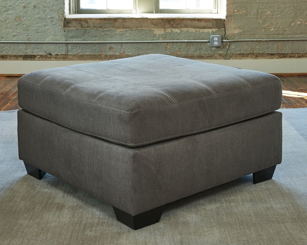 The perfect accent piece for your homey oasis. Posh and practical, this ottoman invites you to kick back and relax. Its ample cushioning and oversized scale make it the ultimate cozy spot to rest your feet at the end of a nonstop day.<br><br><b>Additional