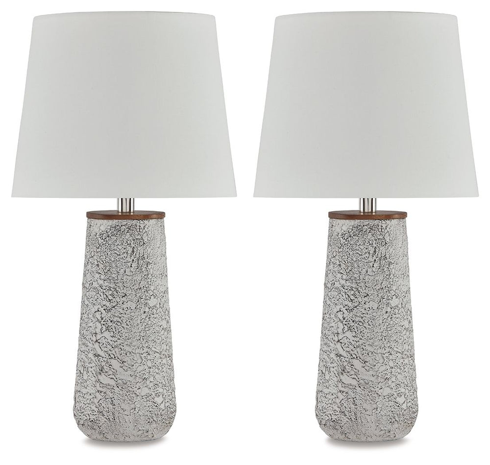 Modern industrial design in a new light. A mixed-media masterpiece, this table lamp provides maximum interest and exceptional versatility with its heavily textured surface. Whether resting on your nightstand or set on a side table, it delivers a unique ae