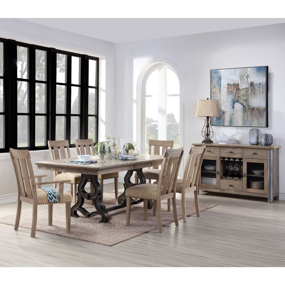 Make your dining room the centerpiece of your home with the Nathaniel dining set. This unique extendable table features a maple wood table top that sits atop an elegant, trestle base. Paring the side and arm chairs with upholstered cushions and nail-head 