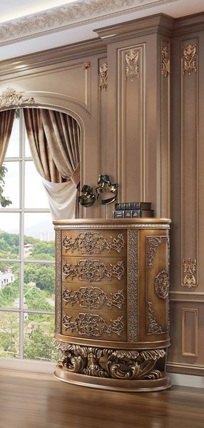 The grand Baroque style of the Constantine collection is sure to impress. With a beautiful bronze finish to emphasize the scrollwork and regal aspects of the collection. The bed features intricately carved embellishments and an oversized PU padded headboa