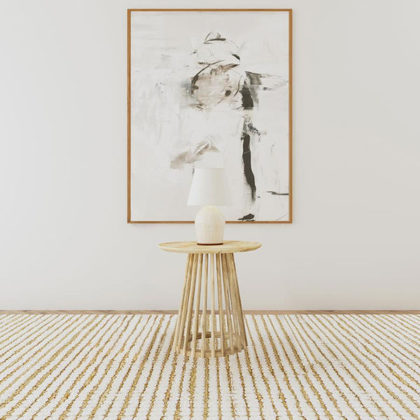  it introduces organic warmth through its solid mango wood construction. As an accent table that can double as a utility table