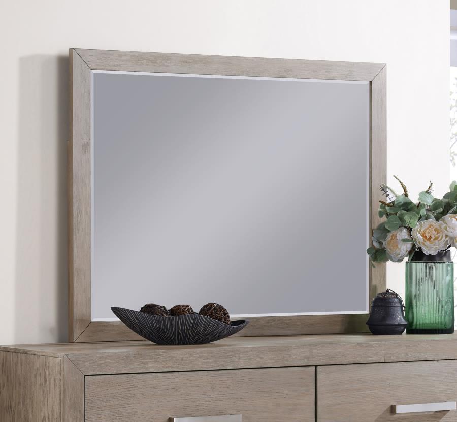 Enhance your bedroom-'s style and functionality with this modern dresser mirror. The sleek frame, finished in a barley brown wood grain, complements any decor while adding a touch of organic warmth. This mirror is perfectly sized to sit atop a dresser, of