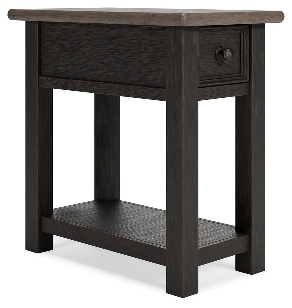 Quality crafted and richly styled, this rectangular chairside end table is sure to charm. Its two-tone aesthetic pairs a weathered grayish brown tabletop with a textured wire brushed base in black. A built-in shelf offers handy display space. And the tabl