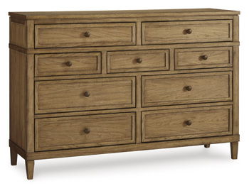 Taking a timeless approach to bedroom beauty, this dresser brings easygoing elegance to the everyday. With its light brown wood tone, it seamlessly slips into your roomâ€™s aesthetic. Dark bronze-tone pulls accent the assorted storage drawers, adding to t