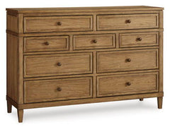 Taking a timeless approach to bedroom beauty, this dresser brings easygoing elegance to the everyday. With its light brown wood tone, it seamlessly slips into your roomâ€™s aesthetic. Dark bronze-tone pulls accent the assorted storage drawers, adding to t