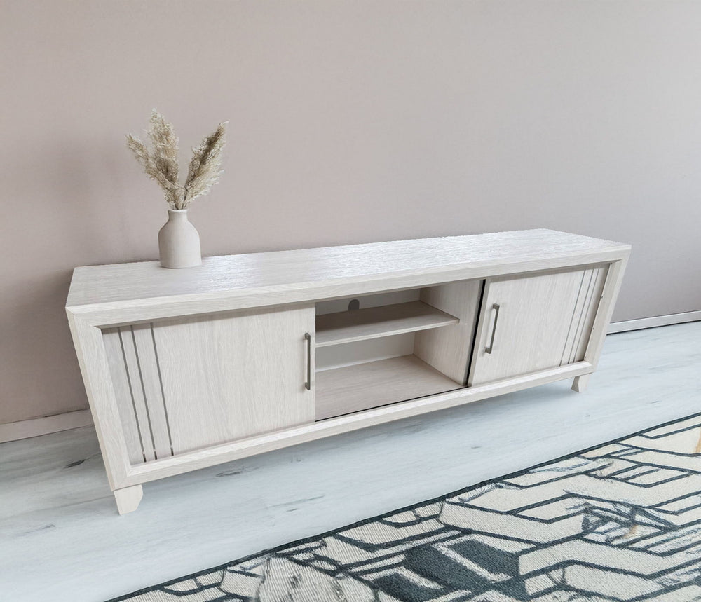Charlie - TV Stand - White<br/><br/><b>Product Features</b><ul><li>Decorative metal accents</li><li>Dual sliding doors</li><li>Interior shelving</li></ul><br/>