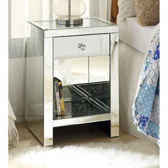Assembled, Rectangular Night Table Storage: 1 Drw & 1 Open Compartment (Bottom Shelf) Features: Mirrored Finish, Top & Shelf w/Faux Diamonds & Clear Glass, Mirrored Sled Base CONSTRUCTION Mirrored Case Frame: 4mm Beveled Mirror, MDF