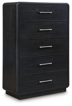 Inspired by art deco design, this softly shaped chest of drawers makes a lasting impression in a simply stunning way. Its magnificent curved silhouette is enhanced by a rich layered black finish on the textured wood grain surface. This is the statement pi