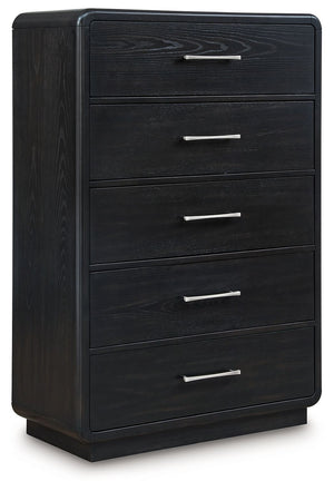 Inspired by art deco design, this softly shaped chest of drawers makes a lasting impression in a simply stunning way. Its magnificent curved silhouette is enhanced by a rich layered black finish on the textured wood grain surface. This is the statement pi