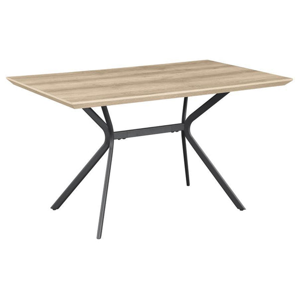 Freshen up your kitchen or dining room with a modern casual dining table. Its rectangular silhouette is versatile and stylish, perfect for multi-functional spaces like breakfast nooks and compact dining rooms. It boasts a medium brown wood grain tabletop 