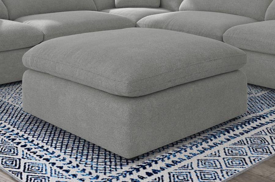 Introduce impeccable comfort with a modern ottoman that coordinates with your modular sectional sofa. This accent piece features neutral water-resistant boucle upholstery for an on-trend look and feel that works in a variety of homes and living spaces. Th