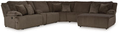 Experience unparalleled comfort with this reclining sectional with chaise. Itâ€™s a stylish and invitingly soft lookâ€”made all the more appealing by cozy corduroy cushions that feel great and add a touch of texture. The rich chocolate brown upholstery ef