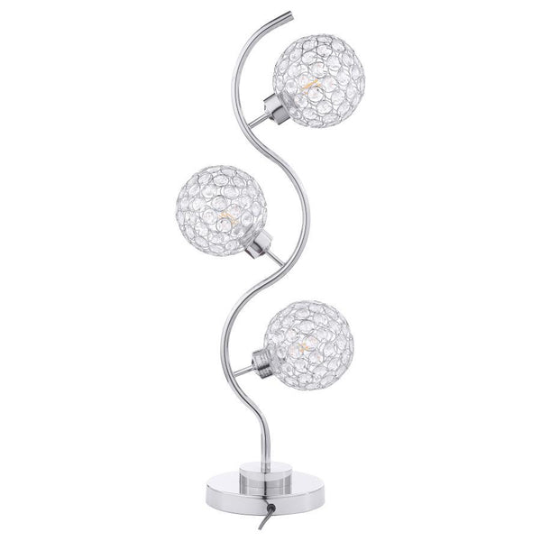 Sparkling with glamour, this modern three-light table lamp is a superb choice for a sophisticated living space. A corkscrew inspired post gleams in a chrome finish and hosts its three lights. Each features an orb shade dotted with crystal-like embellishme