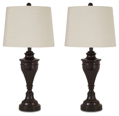A delightfully turned pedestal base gives this table lamp a sense of easy elegance. Its dark bronze-tone metal is a simply stylish counterpoint.<br><br><b>Additional Dimensions</b><br><ul><li>Shade: 0-"</li></ul><br/><br/><b>Product Features</b><ul><li>Ma