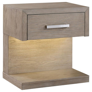 Enhance your stylish bedside with a modern one-drawer nightstand with a built-in LED light. The night table creates a light, airy ambiance with the combination of its open silhouette and accent lighting. It sets an inviting ambiance for relaxation and lou