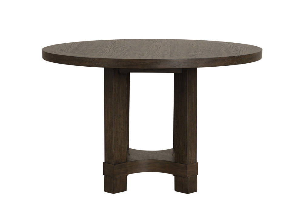 The Cityscape Round Wood Dining Table offers both durability and style, making it a versatile addition to any dining space. Crafted from a blend of resilient Rubberwood solids, manufactured woods, and real Oak veneers, this table highlights the timeless b