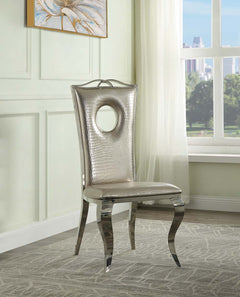 The Cyrene side chairs offer a showstopping shiny chrome base that offsets virtually any color scheme. The plush foam padded seat and backrest are designed for maximum comfort. The chairs are upholstered in a beautiful beige pearlized faux crocodile fabri
