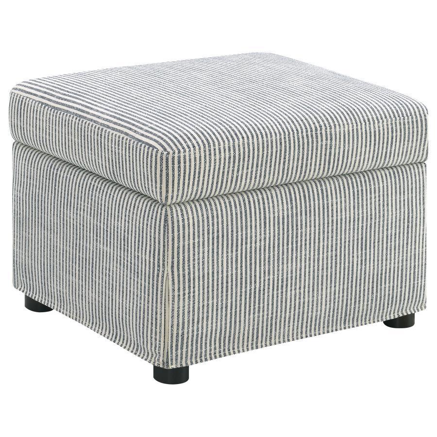 This versatile storage ottoman enriches your living space with stylish functionality. Upholstered in soft, neutral fabric, its hydraulic lift top reveals hidden storage perfect for stashing blankets, magazines, or personal essentials. Use as a footrest, e