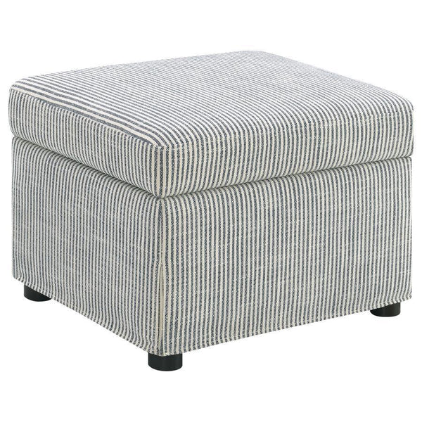 This versatile storage ottoman enriches your living space with stylish functionality. Upholstered in soft, neutral fabric, its hydraulic lift top reveals hidden storage perfect for stashing blankets, magazines, or personal essentials. Use as a footrest, e