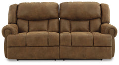 Expansive elegance. This reclining sofa makes a sizable style statement. Its large scale enhances the luxe appearance, magnifying the beauty of richly warm brown faux leather. Polishing off the piece is an effortless reclining motion, which adds a layer o