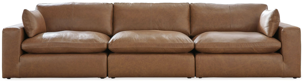 Catering to your contemporary lifestyle, this sectional sofa is a handsome marriage of masculine and feminine sensibilities. Feather-fiber cushions and bolster pillows soften the look of its chunky, linear silhouette. A warmly hued combination of leather 