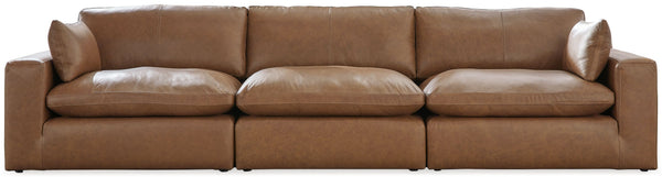 Catering to your contemporary lifestyle, this sectional sofa is a handsome marriage of masculine and feminine sensibilities. Feather-fiber cushions and bolster pillows soften the look of its chunky, linear silhouette. A warmly hued combination of leather 