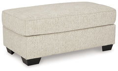 Embrace effortless elegance with this ottoman. Right at home in contemporary settings, the neutral hue easily pairs with your existing color palette. From morning coffee to late-night binge watching, this seating companion keeps you comfortable in chic st