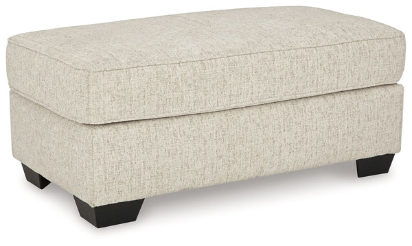 Embrace effortless elegance with this ottoman. Right at home in contemporary settings, the neutral hue easily pairs with your existing color palette. From morning coffee to late-night binge watching, this seating companion keeps you comfortable in chic st