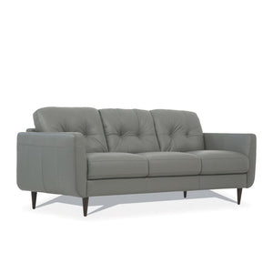  the Radwan sofa set is one youâ€™ll want to spend lots of time in. This beautiful caramel or pesto green leather sofa features button tufted cushions with contrast tone stitching and uniq