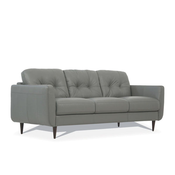  the Radwan sofa set is one youâ€™ll want to spend lots of time in. This beautiful caramel or pesto green leather sofa features button tufted cushions with contrast tone stitching and uniq